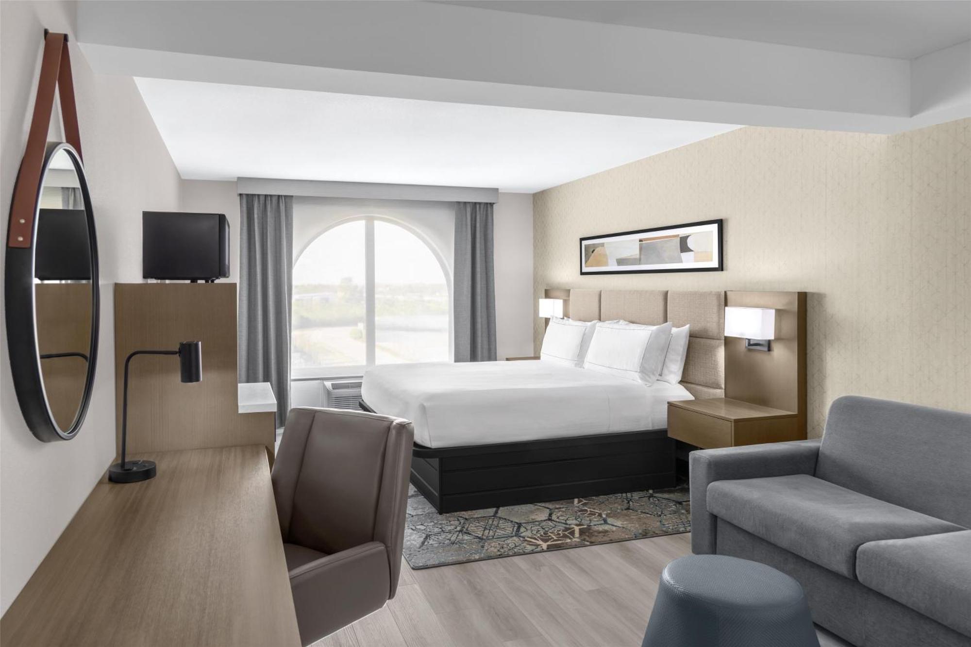 Deluxe King Room with Walk-In Shower and Sofa Bed